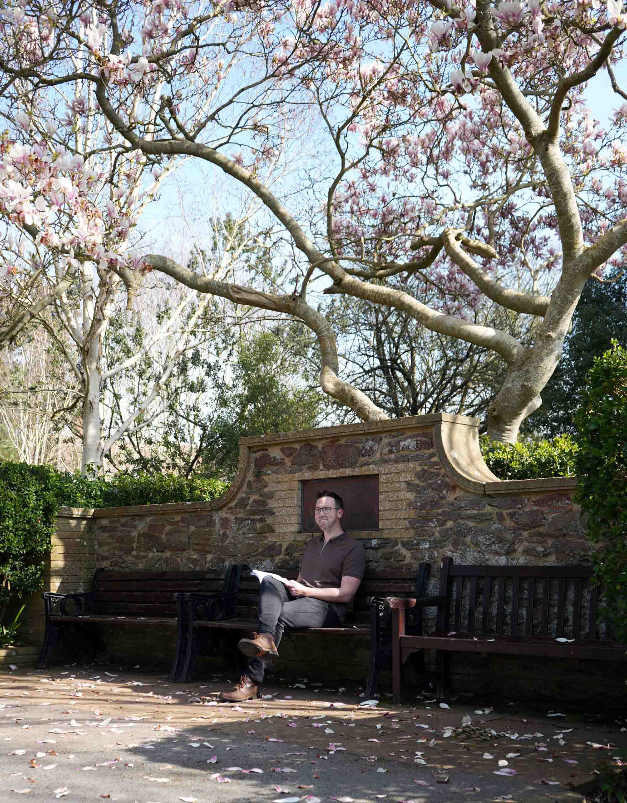 Andy Reading underneath a Magnolia Tree
